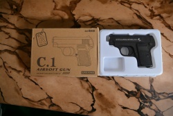 метален пистолет в кутия C1 24x26 см.
