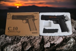 метален пистолет в кутия C10 26x23 см.